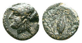 Aeolis, Elaia, AE, Circa 4th Century BC.Obv: Helmeted head of Athena left.Rev: Ε – Λ, Grain ear within olive wreath.Reference :Condition: Very Fine...
