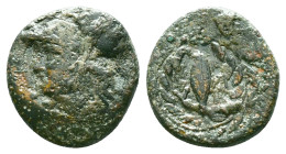 Aeolis, Elaia, AE, Circa 4th Century BC.Obv: Helmeted head of Athena left.Rev: Ε – Λ, Grain ear within olive wreath.Reference :Condition: Very Fine...