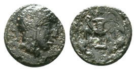 BITHYNIA. Kios. Ae (3rd century BC).Obv: Head of Mithras right, wearing a laureate tiara.Rev: K - I.Kantharos with two grape vines; all within grain w...