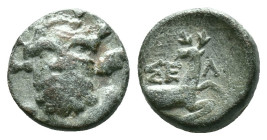 Pisidia, Selge. civic issue. 1st - 2nd centuries B.C. AE Forepart of stag right, head lef, Laureate and bearded head of Herakles facing, lion-skin aro...