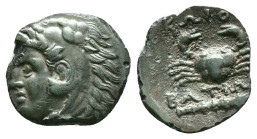 GreekIslands off Caria, Kos, AE, 4th century BC. Islands off Caria, Kos, AE, Bronze,, 4th century BC.Obv:Head of Herakles to left, wearing lion skin h...