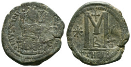 Justinian I (527-565). Æ 40 Nummi . Theoupolis (Antioch), c. 529-533. Justinian seated facing on throne, holding sceptre and globus cruciger. R/ Large...