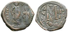 Justin II with Sophia (565-578 AD).ConstantinopleAE Follis Obv: DN IVSTI NVS PP AVC, Justin, holding globus cruciger, and Sophia, holding cruciform sc...