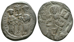 CONSTANTINE X DUCAS with EUDOCIA (1059-1067). Follis. Constantinople. Obv: + ЄMMANOVHΛ / IC - XC. Christ Pantokrator standing facing on footstool. Rev...