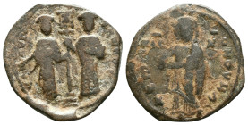 CONSTANTINE X DUCAS with EUDOCIA (1059-1067). Follis. Constantinople. Obv: + ЄMMANOVHΛ / IC - XC. Christ Pantokrator standing facing on footstool. Rev...
