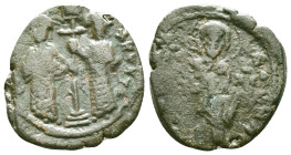 CONSTANTINE X DUCAS with EUDOCIA (1059-1067). Follis. Constantinople. Obv: + ЄMMANOVHΛ / IC - XC. Christ Pantokrator standing facing on footstool. Rev...