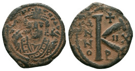 Maurice Tiberius. 582-602. AE half follis. ConstantinopleHelmeted and cuirassed bust of Maurice facing, holding globus cruciger and shieldRev. Large K...