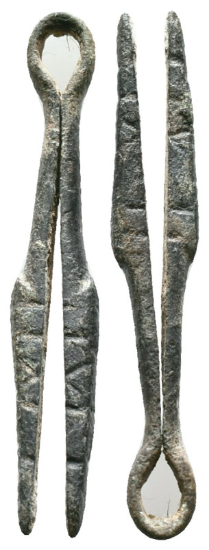 Ancient Roman bronze medical tweezer,

Reference :
Condition: Very Fine

We...