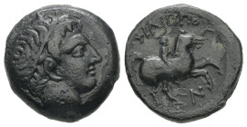Kings Of Macedon, Philip II. Ae, 6.01 g 17.15 mm. 359-336 BC. Uncertain mint in Macedon.
Obv: Diademed head of Apollo right.
Rev: ΦΙΛΙΠΠΟΥ. Naked yout...