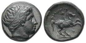 Kings of Macedon, Philip II. Ae,5.96 g 18.03 mm. 359-336 BC. Uncertain mint.
Obv: Diademed head of Apollo right.
Rev: ΦIΛIΠΠOY,Horseman right. Uncerta...