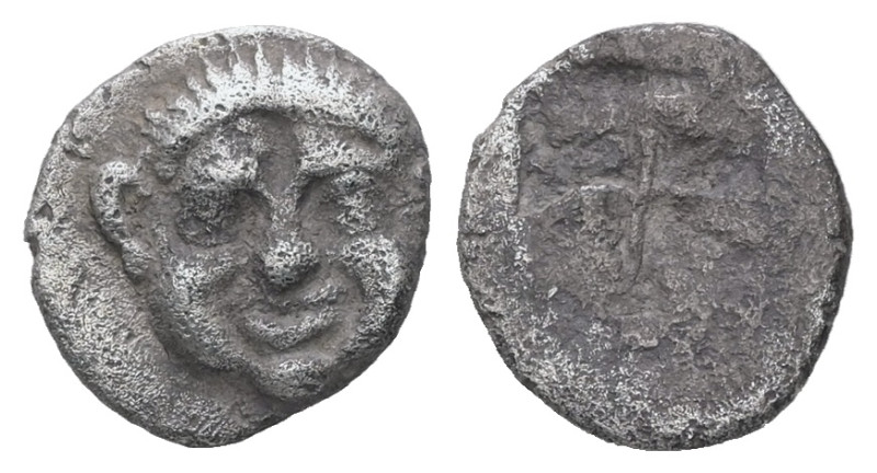 Macedon, Neapolis. AR Obol, 0.67 g 9.92 mm. Circa 500-480 BC.
Obv: Gorgoneion fa...