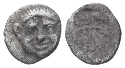 Macedon, Neapolis. AR Obol, 0.67 g 9.92 mm. Circa 500-480 BC.
Obv: Gorgoneion facing with protruding tongue.
Rev: Quadripartite incuse square.
Ref: HG...