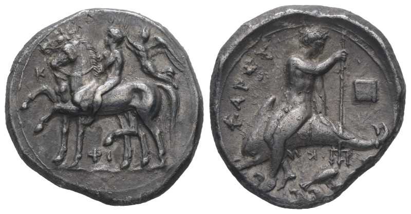 Calabria,Tarentum. AR Stater, 7.82 g 22.08 mm. Ca. 340-335 BC.
Obv: Two horses ...