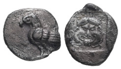 Troas, Abydos. AR, Obol. 0.80 g. 11.06 mm. Circa 480-450 BC.
Obv.: Eagle standing left with wings closed.
Rev.: Facing gorgoneion with protruding tong...