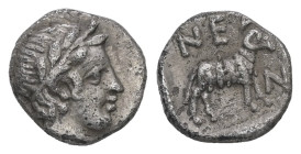 Troas, Neandria. AR Hemiobol, 0.58 g 8.71 mm. 4th century BC.
Obv: Laureate head of Apollo right.
Rev: NEA N, Ram standing right within incuse square....