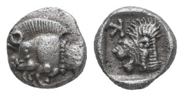 Mysia, Kyzikos. AR Hemiobol. 0.38 g. 7.05 mm. Circa 525-475 BC.
Obv.: Forepart of boar left; to right, tunny upward.
Rev.: Head of lion left; retrogra...