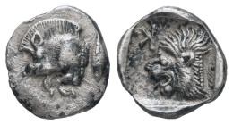 Mysia, Kyzikos. AR Obol, 0.80 g 10.89 mm. Circa 450-400 BC.
Obv.: Forepart of boar left; tunny to right.
Rev.: Head of roaring lion left; retrograde K...
