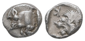 Mysia, Kyzikos. AR Obol, 0.81 g 9.82 mm. Circa 450-400 BC.
Obv.: Forepart of boar left; tunny to right.
Rev.: Head of roaring lion left; retrograde K ...