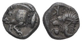 Mysia, Kyzikos. AR Obol, 0.78 g 9.24 mm. Circa 450-400 BC.
Obv.: Forepart of boar left; tunny to right.
Rev.: Head of roaring lion left; retrograde K ...
