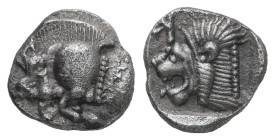 Mysia, Kyzikos. AR Obol, 0.84 g 9.36 mm. Circa 450-400 BC.
Obv.: Forepart of boar left; tunny to right.
Rev.: Head of roaring lion left; retrograde K ...