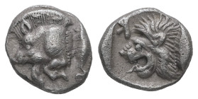 Mysia, Kyzikos. AR Obol, 0.78 g 10.02 mm. Circa 450-400 BC.
Obv.: Forepart of boar left; tunny to right.
Rev.: Head of roaring lion left; retrograde K...