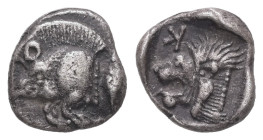 Mysia, Kyzikos. AR Obol, 0.64 g 9.16 mm. Circa 450-400 BC.
Obv.: Forepart of boar left; tunny to right.
Rev.: Head of roaring lion left; retrograde K ...