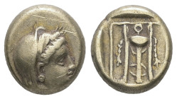 Lesbos, Mytilene. EL Hekte, 2.52 g 11.20 mm. Circa 377-326 BC.
Obv: Veiled head of Demeter right, wearing grain wreath.
Rev: Filleted tripod within li...