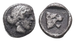 Lesbos, Mytilene. AR Obol, 0.38 g 7.09 mm. Circa 440-400 BC.
Obv: Female head right.
Rev: MY[TI], Head of roaring lion right in incuse square.
Ref: BM...