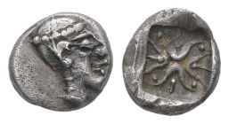 Ionia, Uncertain mint. AR Hemiobol, 0.36 g 6.91 mm. 5th century BC. 
Obv: Archaic female head to right, wearing helmet or close fitting cap. 
Rev: Ste...