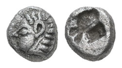 Ionia, Kolophon. AR Tetartemorion. 0.19 g. - 4.77 mm. Late 6th century BC.
Obv.: Archaic head of Apollo to left.
Rev.: Quadripartite incuse square.
Re...