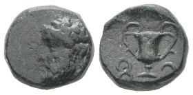 Lydia, Uncertain. Ae, 2.72 g 12.12 mm. 4th century BC. 
Obv: Wreathed head of Dionysos left 
Rev: Kantharos; F (in Lydian) and S (in Lydian) flanking....