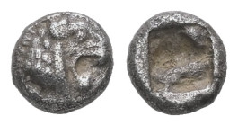 Kings of Lydia. Kroisos, 1/48 AR Stater, 0.21 g 5.03 mm. Circa 564/53-550/39 BC. Sardes.
Obv.: Head of roaring lion right.
Rev.: Rough incuse punch.
R...