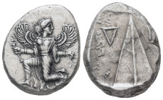 Caria, Kaunos. AR Stater, 11.66 g 23.94 mm. Circa 410-390 BC.
Obv: Winged female figure in kneeling-running stance left, head right, holding kerykeio...