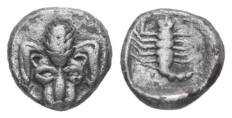 Caria, Mylasa. AR Hemiobol, 0.44 g 7.74 mm. Circa 450-400 BC.
Obv: Forepart of l...