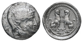 Lycia, Tlos. AR Diobol, 1.21 g 12.92 mm. Circa 400-390 BC. 
Obv: Helmeted head of Athena right 
Rev: Two panthers seated facing one another, each rais...