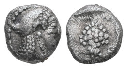 Cilicia, Soloi. AR Obol, 0.78 g 7.67 mm .Circa 440-410 BC. 
Obv: Head of Amazon right, wearing pointed cap 
Rev: Grape bunch; [Σ]-O flanking; all with...