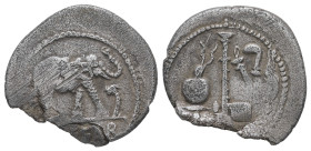 Julius Caesar, 49 BC. AR, Denarius. 3.28 g. 19.68 mm. Rome.
Obv: CAESAR. Elephant advancing right, trampling upon horned serpent.
Rev: Emblems of the ...