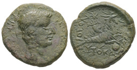 Uncertain. Augustus, 27 BC-14 AD. AE. 10.51 g. 25.95 mm.
Obv: Bare head of Augustus, right.
Rev: ΘΕΟΝ ΑΥΤΟΚΡΑΤΟΡΑ. Capricorn, right; above, cornucopia...