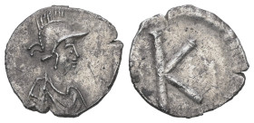 Anonymous. Time of Justinian I, AD 527-565. AR, Third Siliqua (?) 1.05 g. 14.36 mm. Constantinople.
Obv: Bust of Constantinopolis facing right helmete...