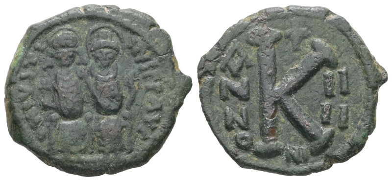 Justin II and Sophia, AD 565-578. AE, Half Follis. 6.71 g. 24.91 mm. Nicomedia.
...