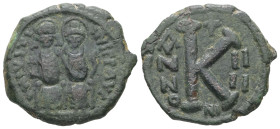 Justin II and Sophia, AD 565-578. AE, Half Follis. 6.71 g. 24.91 mm. Nicomedia.
Obv: DNIVSTI-NVSPPAV. Justin II on left and Sophia on right, seated, n...
