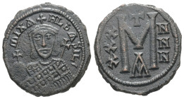 Michael I Rhangabe, 811-813 AD. AE, Follis. 5.90 g. 23.54 mm. Constantinople.
Obv: MIXAHL ЬASILЄ. Facing bust of Michael, wearing crown with cross on...