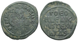 Theophilus, AD 829-842. AE, Follis. 8.34 g. 29.79 mm. Constantinople.
Obv: ΘEOFIL-bASIL. Crowned, three-quarter length figure of Theophilus facing, pe...