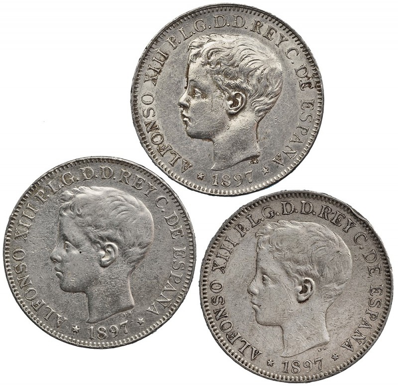 Lote de 3 piezas de un peso. 1897. Manila, SGV. VII-192. MBC-/MBC.