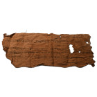 Late-Ptolemaic Period, circa 480-30 B.C. A rectangular section of woven linen textile featuring four lines of neat hieratic text in black. Cf. A. De C...