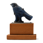 Ptolemaic Period, circa 332-30 B.C. Modelled in the half-round with low-relief hatched detailing; perching on a D-section base; mounted on a silver su...