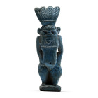 Third Intermediate Period, circa 1069-735 B.C. Modelled in the round, Bes standing nude with a lion's tail, wearing a feathered headdress. Cf. Andrews...