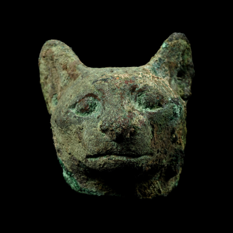 Egyptian Bronze Head of a Cat. Late-Ptolemaic Period, 664-30 B.C. The head of go...