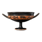 Circa 540 B.C. With a deep bowl resting on a short stem and flared foot, the inner face with a central roundel, the outer face with a frieze of animal...