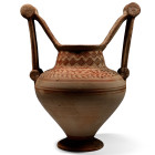 6th century B.C. With piriform body resting on a delineated foot, tubular neck with everted, inward sloping rim; two large handles projecting from the...